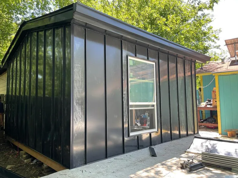 Black standing seam metal wall panels for Metal Roof Installation in Spearfish