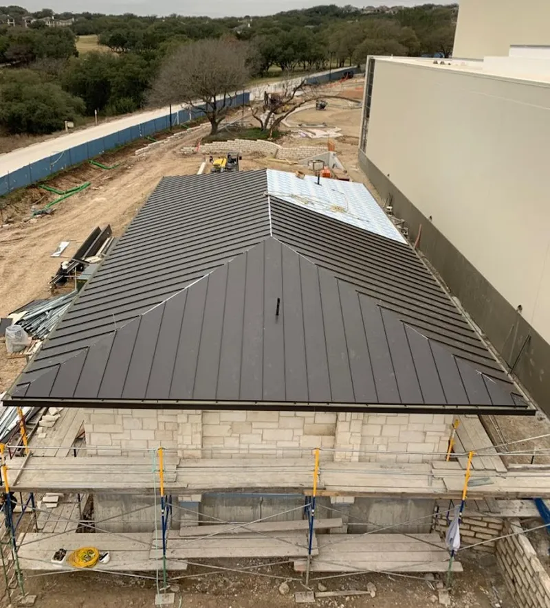 Metal roof new construction with scaffolding in Spearfish