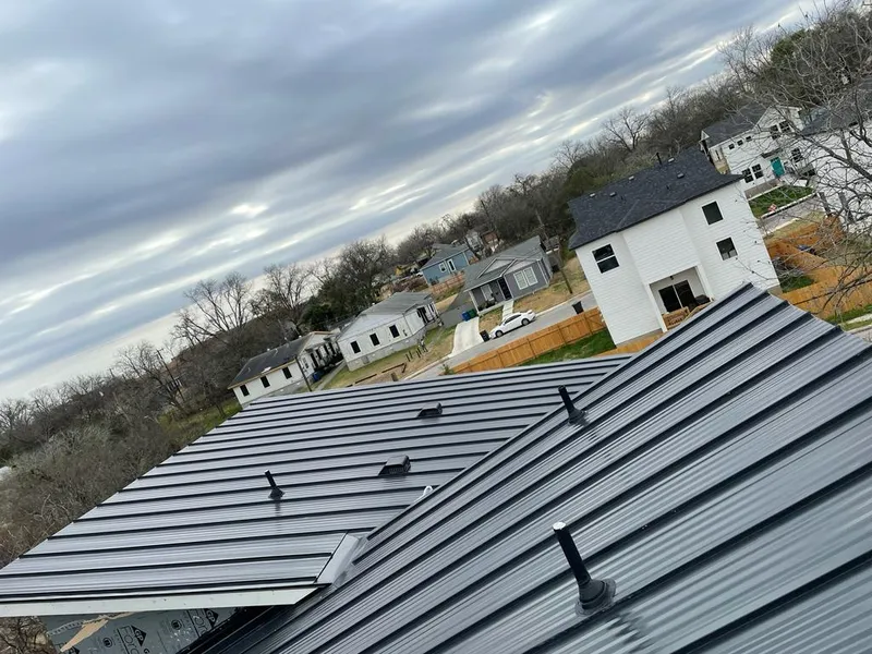 Standing seam metal roof panels with vents for Skylight Repair in Spearfish
